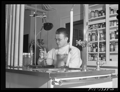 Aseptic dispensing of carbohydrate broth. USPHS (United States Public Health Service)  Rocky Mountain Laboratory. Hamilton, Montana