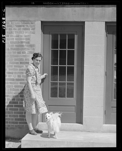 New Bedford, Massachusetts. Wife of a Portuguese house painter before their home in a low income federal housing project