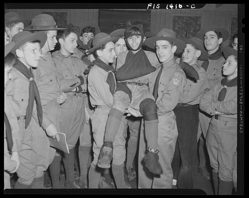 Untitled photo, possibly related to: New Bedford, Massachusetts. Portuguese scout troop performing stunt
