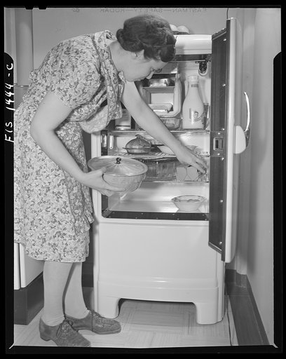New Bedford, Massachuetts. Wife of Portuguese house painter in her home built by the government