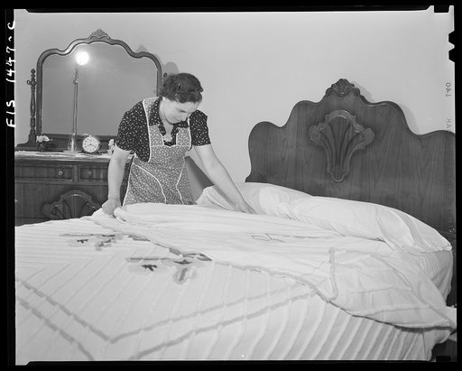 New Bedford, Massachusetts. Wife of Portuguese house painter in her government built home