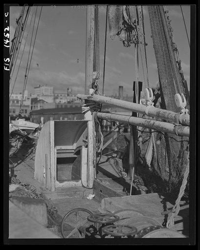 Untitled photo, possibly related to: New Bedford, Massachusetts. Mast and spars of a Portuguese trawler