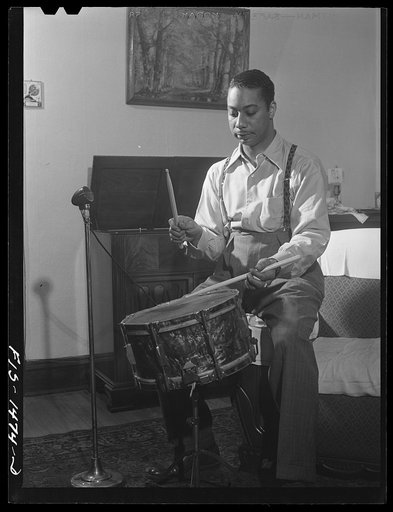 Untitled photo, possibly related to: Oliver Coleman in his studio at home, practicing a new number on a practice board. Chicago, Illinois