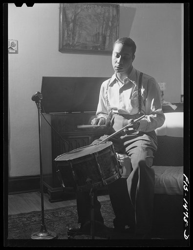 Untitled photo, possibly related to: Oliver Coleman in his studio at home, practicing a new number on a practice board. Chicago, Illinois