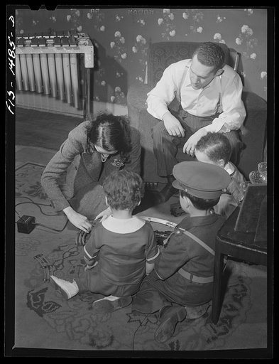 Untitled photo, possibly related to: Chicago, Illinois. "Red" Sounders' [i.e. Saunders] children playing with a neighbor's little boy (in soldier's uniform) whose name is Martin Brown