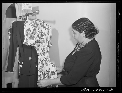 Miss Cecilia Hall, owner and manager of Rosetta Frocks, a dress shop on South Park, near 47th Street, Chicago, Illinois. She has been in business for ten years