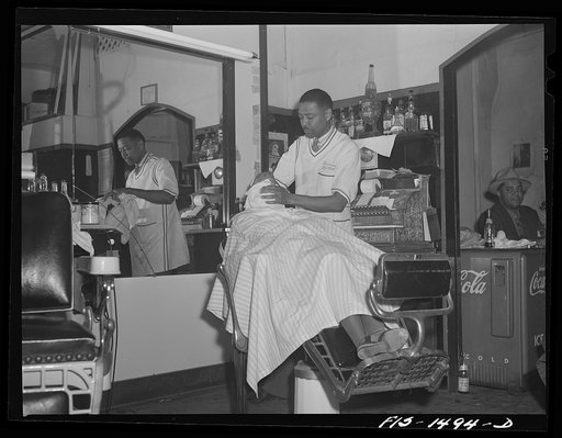 Mr. Oscar J. Freeman, barber, owns the Metropolitan Barber Shop, 4654 South Parkway, Chicago, Illinois. Mr. Freeman has been in business for fourteen years