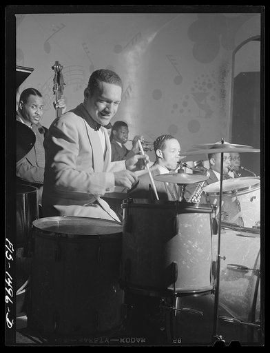 "Red" Sounders [i.e. Saunders], drummer, and his band, at the Club DeLisa, Chicago, Illinois