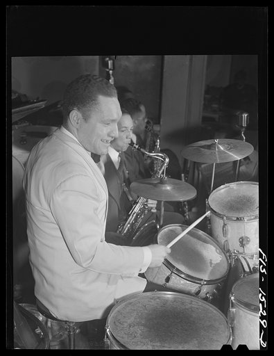 "Red" Sounders [i.e. Saunders], drummer, and his band at the Club DeLisa, Chicago, Illinois