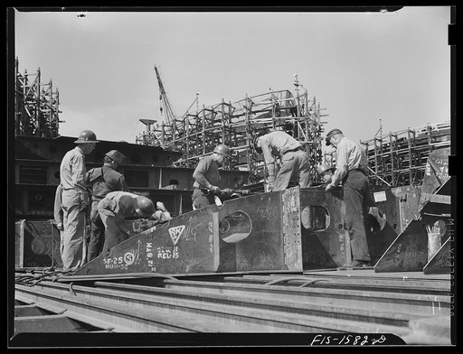 California Shipbuilding Corporation, Wilmington, California. Welders working on the horizontal framework of a double bottom section