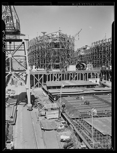 California Shipbuilding Corporation, Wilmington, California. Prefabricated double bottom section in position on the assembly platform before being swung into place by a giant crane