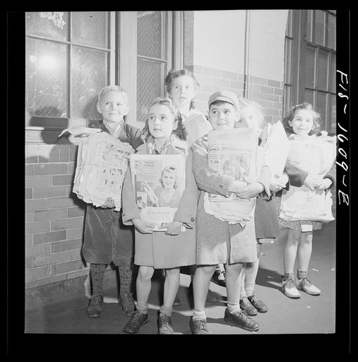 Untitled photo, possibly related to: Washington, D.C. Scrap salvage campaign, Victory Program. Washington schoolchild brings a load of scrap paper to school once a week. Here it is collected by paper company truck