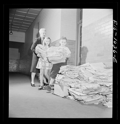 Untitled photo, possibly related to: Washington, D.C. Scrap salvage campaign, Victory Program. Schoolchildren contributing to their class pile of scrap paper. Classes compete for greatest amount