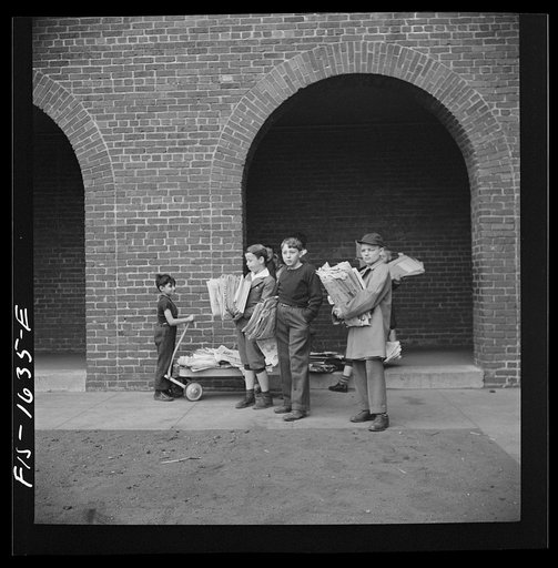 Untitled photo, possibly related to: Washington, D.C. Scrap salvage campaign, Victory Program. Children bringing their weekly contribution of scrap paper to school