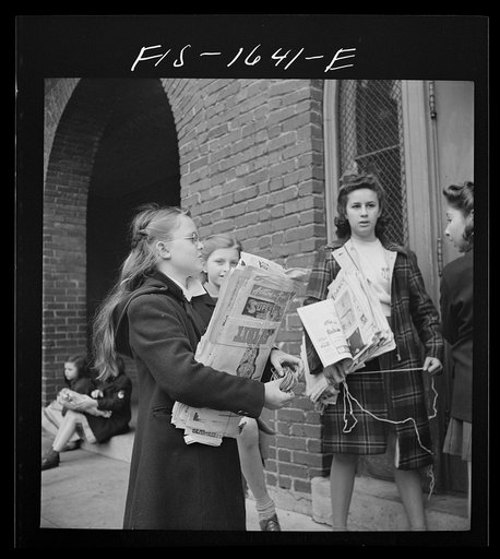 Untitled photo, possibly related to: Washington, D.C. Scrap salvage campaign, Victory Program. Children bringing their weekly contribution of scrap paper to school