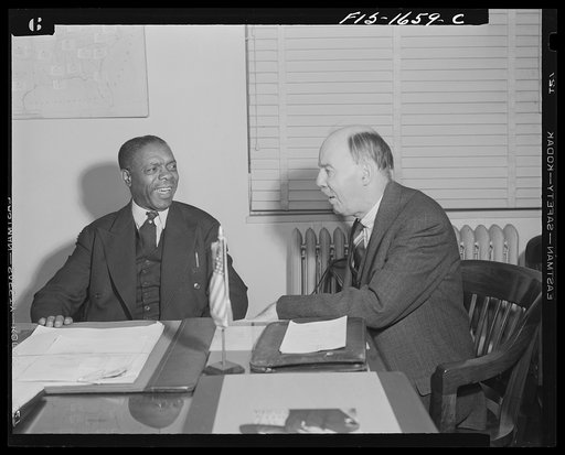 Washington, D.C. Dean William Pickens and James L. Houghteling of the United States Treasury Department. Houghteling is director of the Division of National Organizations