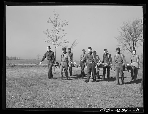 Learning the proper use of stretchers at a first aid class at the U.S. Army chaplain school. Fort Benjamin Harrison, Indiana