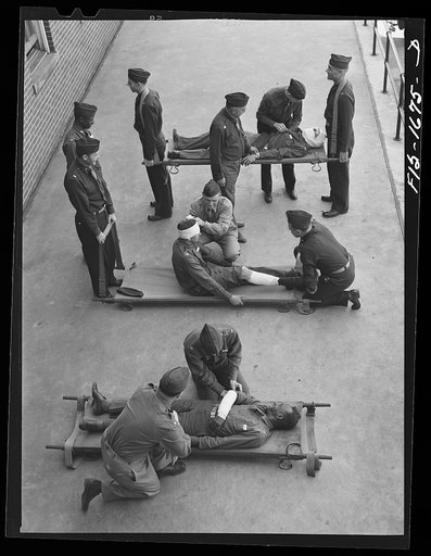 Untitled photo, possibly related to: A class in first aid at the U.S. Army chaplain school. Fort Benjamin Harrison, Indiana