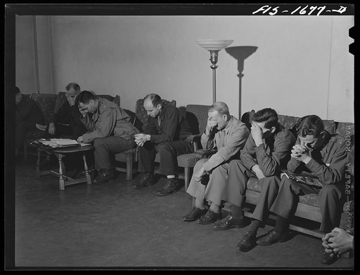 Untitled photo, possibly related to: Chaplain Lieutenant Colonel Paul B. Rupp, conducting devotional service for Protestant chaplains at the U.S. Army chaplain school. Fort Benjamin Harrison, Indiana. This is a daily part of the religious training of the chaplains
