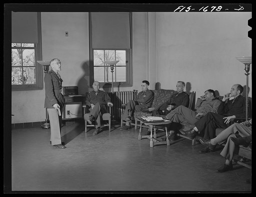 Chaplain Lieutenant Colonel Paul B. Rupp, conducting devotional service for Protestant chaplains at the U.S. Army chaplain school. Fort Benjamin Harrison, Indiana. This is a daily part of the religious training of the chaplains