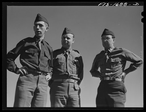 Chaplain Fred W. Thissen, Catholic (left), Chaplain Ernest Pine, Protestant (center), and Chaplain Jacob Rothschild, Jewish (right), students at the U.S. Army chaplain school. Fort Benjamin Harrison, Indiana