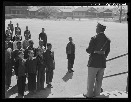 Untitled photo, possibly related to: School children at a grammar school in Indianapolis listening to a speech by Chaplain George Washington Williams, who is just graduating from the U.S. Army chaplain school. Fort Benjamin Harrison, Indiana