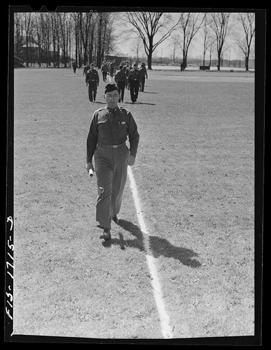 Untitled photo, possibly related to: Every chaplain must learn how to pace distances by counting the number of his paces over a measured hundred yard course. U.S. Army chaplain school, Fort Benjamin Harrison, Indiana