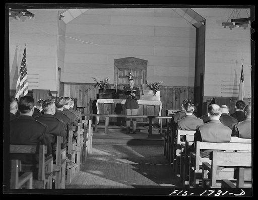 Chaplain Martin J. Stein conducting services in the post chapel at Fort Benjamin Harrison, Indiana. He is a Lutheran minister from Minneapolis, Minnesota