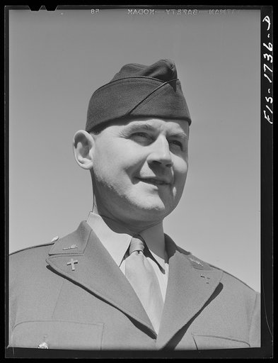 Chaplain Dominic Ternan of New York City, Catholic, who is completing his course at the U.S. Army chaplain school. Fort Benjamin Harrison, Indiana