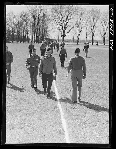 Untitled photo, possibly related to: Every chaplain must learn how to pace distances by counting the number of his paces over a measured hundred yard course. U.S. Army chaplain school, Fort Benjamin Harrison, Indiana