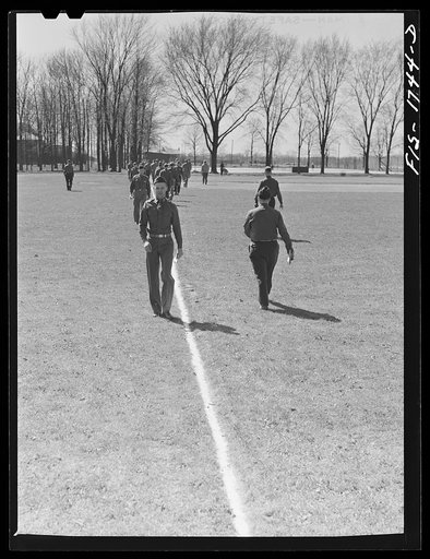 Untitled photo, possibly related to: Every chaplain must learn how to pace distances by counting the number of his paces over a measured hundred yard course. U.S. Army chaplain school, Fort Benjamin Harrison, Indiana