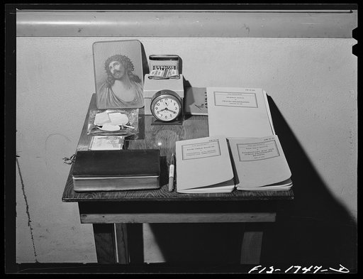 Untitled photo, possibly related to: A bedside table of one of the chaplains of the U.S. Army chaplain school. Fort Benjamin Harrison, Indiana