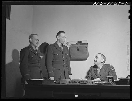 Chaplains Martin J. Stein and Thadieth Son of Brownwood, Texas, saying goodbye to Chaplain William D. Cleary, Commandant of the U.S. Army chaplain school. Fort Benjamin Harrison, Indiana