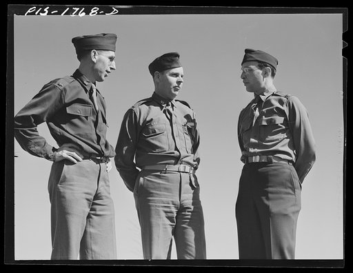 Chaplain Fred W. Thissen, Catholic, left, Chaplain Ernest Pine, Protestant, center, and Chaplain Jacob Rothschild, Jewish, right, students at the U.S. Army chaplain school. Fort Benjamin Harrison, Indiana