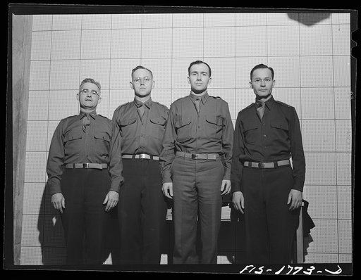 Chaplains Anthony J. O'Driscoll (Order of Friars Minor Franciscan), Eugene Lamb (Society of Mary), Walter J. Poynton (Order of Carmelites), and Mark J. Linenber (Order of Friars Minor Capuchin), students at the U.S. Army chaplain school. Fort Benjamin Harrison, Indiana