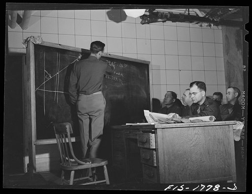 Untitled photo, possibly related to: Lieutenant Lawrence Curran teaching a class in map reading at the U.S. Army chaplain school. Fort Benjamin Harrison, Indiana