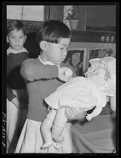 Chinese kindergarten pupil at the San Leandro, California grade school. While about seventy percent of the school children are of Portuguese descent, many nationalities are represented
