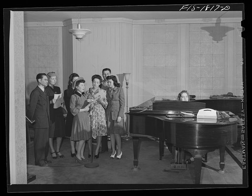 Group of Portuguese who put on an hour program daily over station KROW. The program, which is in Portuguese, is composed of social and club notices, comic and dramatic plays and skits, music, songs and news. This program has been on the air continuously for twelve years, and is supported entirely by