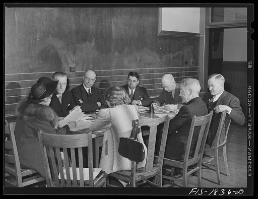 Mr. A.J. Oliveira, fourth from left, attending a meeting of the San Leandro, California school board