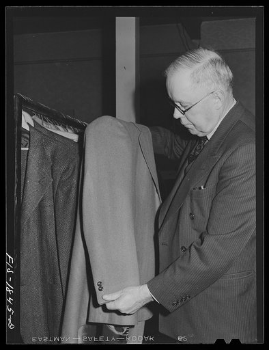 Mr. J.R. Kardoza, whose parents were born in the Azores Islands, owns a men's shop in San Leandro, California, which is also his birthplace. Mr. Kardoza says, "No Fifth Columnists here. We're 100% Americans. We are buying bonds and we want to do everything we can to keep this country, which has give
