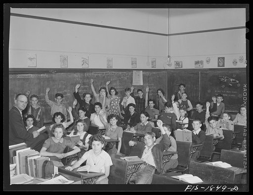 Classroom in a grade school of San Leandro, California. All children with their hands raised are of Portuguese descent, and are proud of it