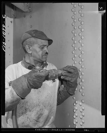 Untitled photo, possibly related to: Newport News, Virginia. Negro shipyard worker