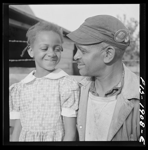 Untitled photo, possibly related to: Newport News, Virginia. Negro shipyard worker and one of his daughters