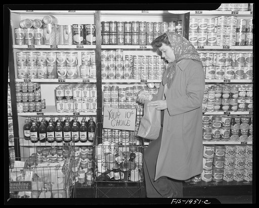 Provincetown, Massachusetts. Mrs. John Russe, wife of a Portuguese fisherman, buying groceries