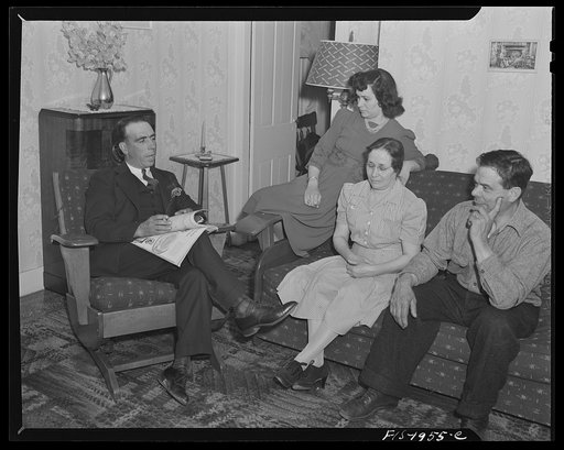 Untitled photo, possibly related to: Provincetown, Massachusetts. John Russe, Jr., a Portuguese fisherman, entertaining his wife's mother and father
