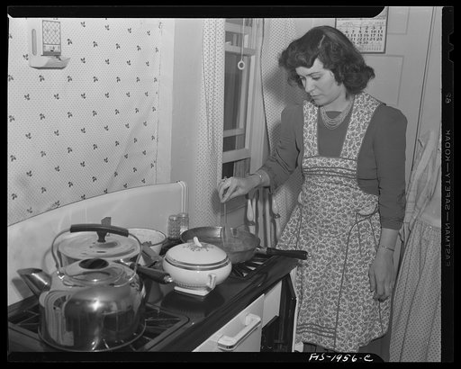 Provincetown, Massachusetts. Mrs. John Russe, wife of a Portuguese fisherman, cooking dinner
