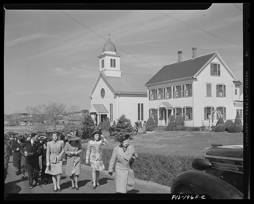 Untitled photo, possibly related to: Provincetown, Massachusetts. Congregation leaving church in a Portuguese section