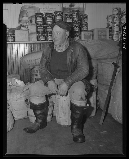 Provincetown, Massachusetts. Portuguese gossiping in the ship chandler's store