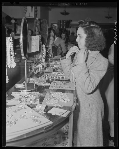Untitled photo, possibly related to: New Bedford, Massachusetts. Mrs. Marcio and her daughter shopping