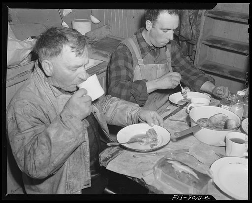 Procincetown, Massachusetts. Aboard the Frances and Marion, a Portuguese drag trawler, fishing off Cape Cod. Dinner aboard